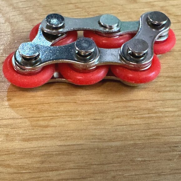 Fidget Toy: 4 Piece Flippy Roller Flick (Bike) Chain Fidget Toys with Case - Picture 8 of 16